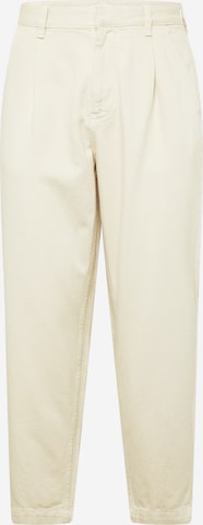 Tommy Jeans Loosefit Kalhoty se sklady v pase 'BAX' – béžová: přední strana