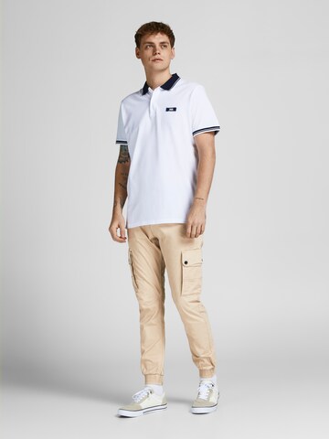 JACK & JONES Alt kitsenev Klapptaskutega püksid 'JWHPAUL JJWARNER', värv beež