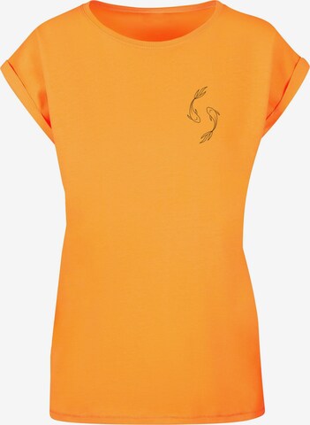 Merchcode Shirt ' Ladies Spring -  Yin & Jang Fish' in Oranje: voorkant