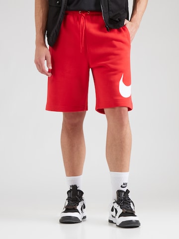 Largi Pantaloni 'CLUB' de la Nike Sportswear pe roșu: față