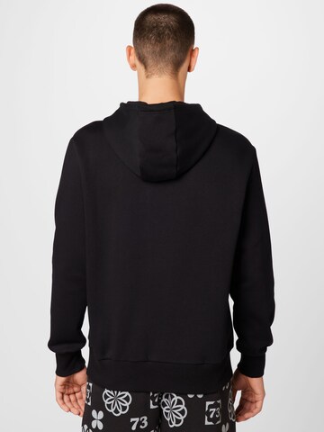 PUMA - Sweatshirt de desporto em preto