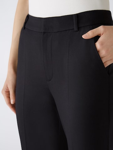 OUI Slim fit Trousers with creases 'FEYLIA' in Black