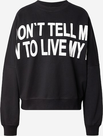 Elias RumelisSweater majica 'IKORIA' - crna boja: prednji dio