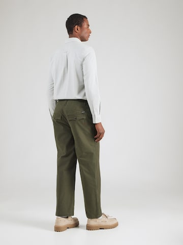 SCOTCH & SODA Regularen Hlače | zelena barva