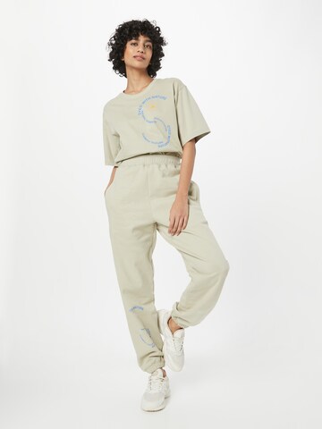 ADIDAS BY STELLA MCCARTNEY Tapered Sporthose in Gelb