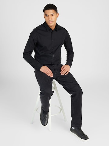 Calvin Klein Jeans Kitsas lõige Triiksärk, värv must