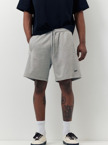 Pull&Bear Loosefit Housut 'STWD' värissä musta: etupuoli