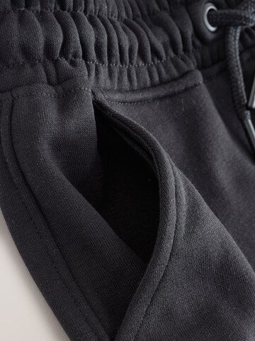 Tapered Pantaloni de la Next pe negru