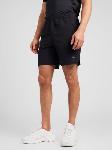 Reebok - Regular Calças de desporto 'STRENGTH' em preto: frente