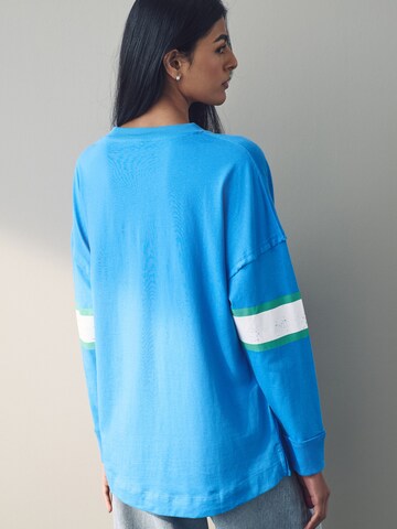 Tricou de la Next pe albastru