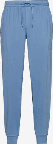 NIKE Workout Pants in Blue: front