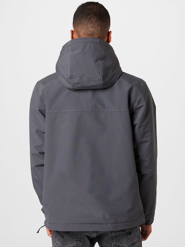 Carhartt WIP Regular Fit Välikausitakki 'Nimbus' värissä harmaa