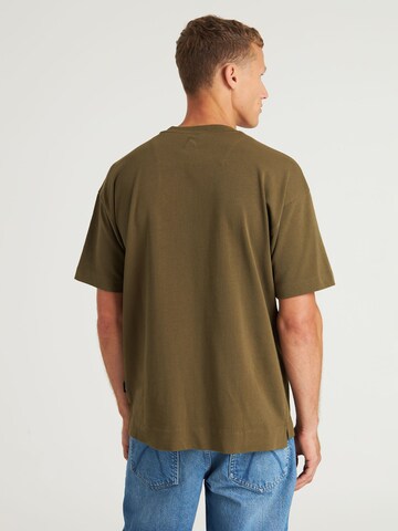 CHASIN' T-Shirt 'Xpose' in Grün