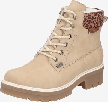 Bottines à lacets Rieker en beige : devant