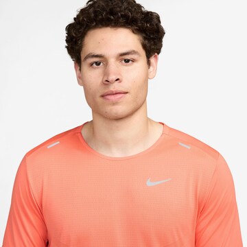 NIKE Performance Shirt 'Rise 365' in Orange