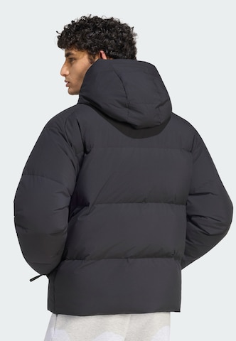 ADIDAS SPORTSWEAR - Chaqueta deportiva 'Helionic' en negro