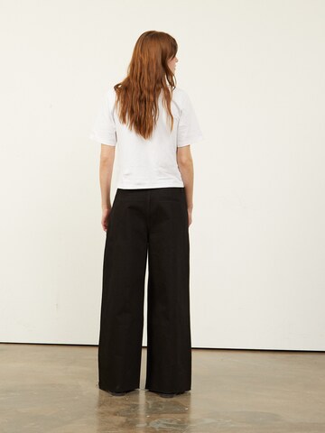 Wide leg Jeans con pieghe 'Connie' di Aligne in nero