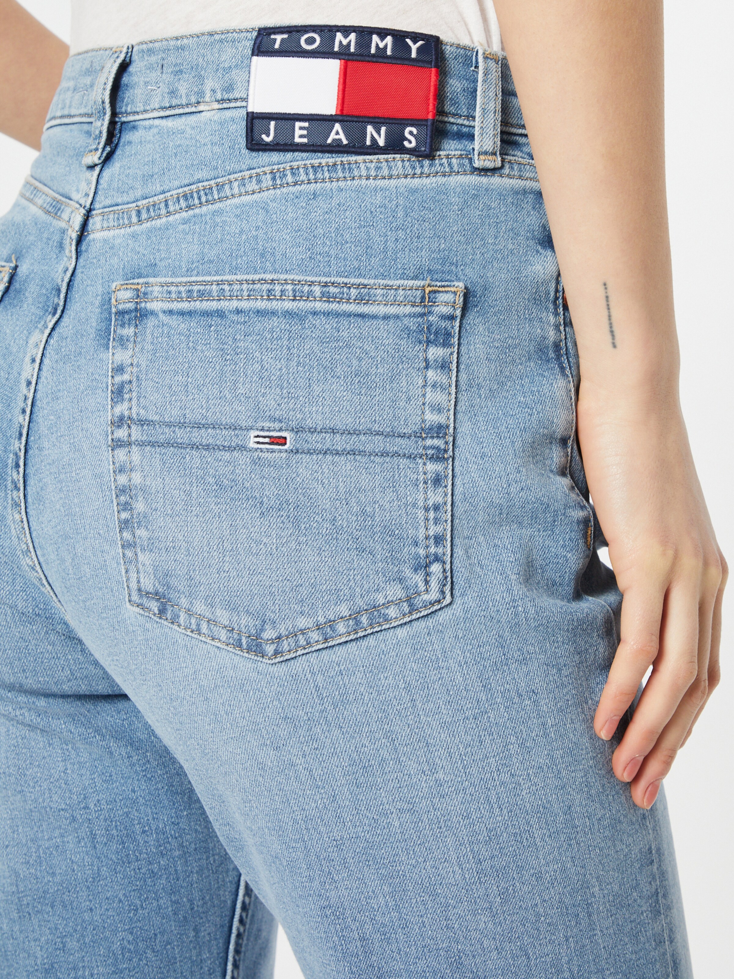 Šviesiai Mėlyna Tommy Jeans Džinsai 'HARPER' | ABOUT YOU