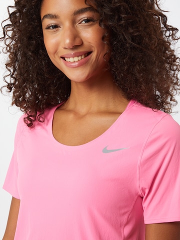 NIKE - Camiseta funcional 'City Sleek' en rosa