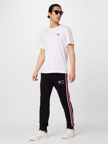 Champion Authentic Athletic Apparel Tapered Hose in Schwarz