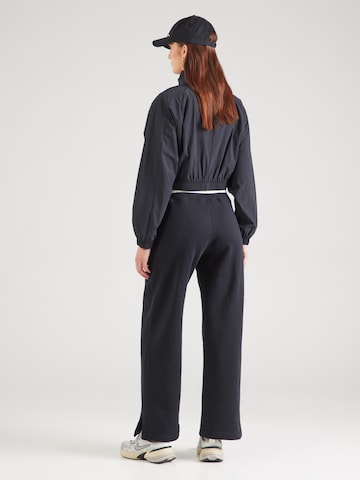 Nike Sportswear Wide leg Trousers 'PHNX FLC' in Black