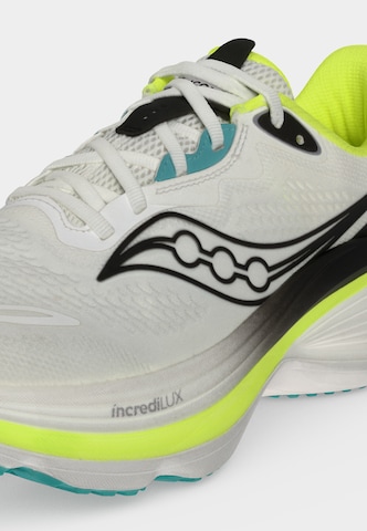 Chaussure de course saucony en blanc