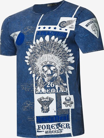 Rusty Neal T-Shirt mit Oil Washed Skull All Over Front Print in Blau