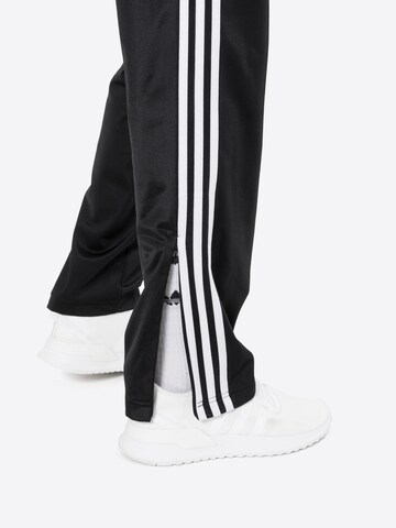 regular Pantaloni 'Firebird' di ADIDAS ORIGINALS in nero