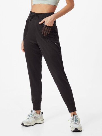 Tapered Pantaloni sport de la PUMA pe negru: față