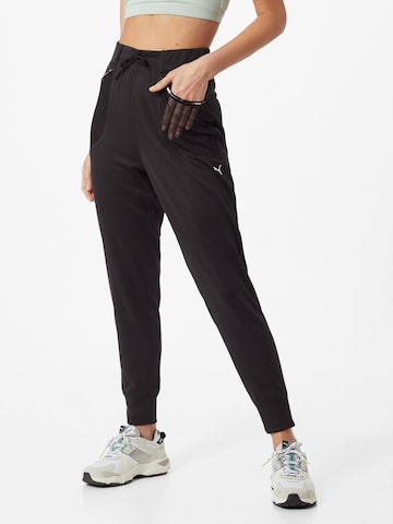 Effilé Pantalon de sport PUMA en noir : devant