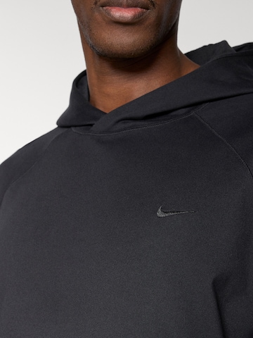 Hanorac sport de la NIKE pe negru