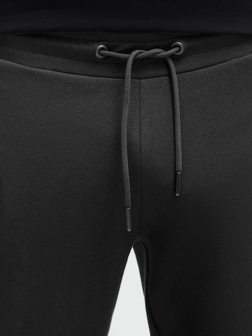 CAMP DAVID Tapered Pants in Black