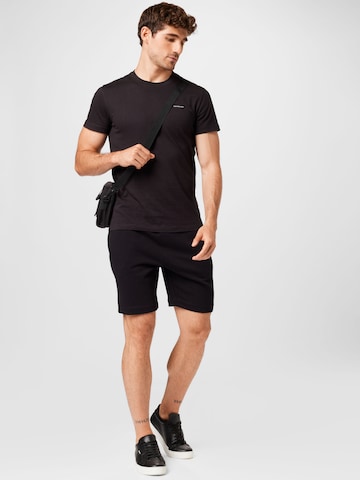 regular Pantaloni di LACOSTE in nero