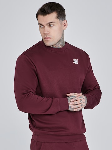 Pull-over SikSilk en rouge : devant