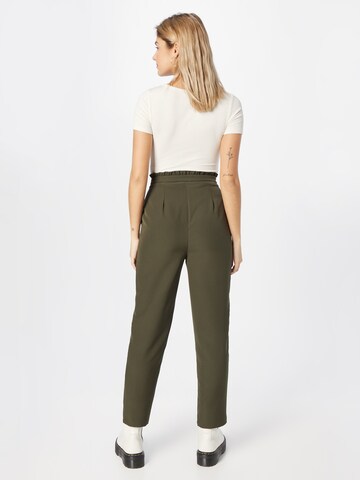 ABOUT YOU Tapered Pleat-Front Pants 'Meline' in Green