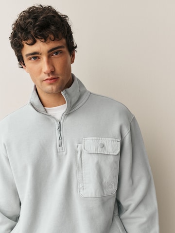 pilka Next Megztinis be užsegimo