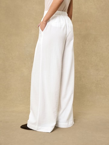 Wide leg Pantaloni di Next in nero