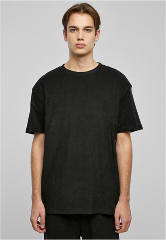 Urban Classics - Camiseta en negro: frente