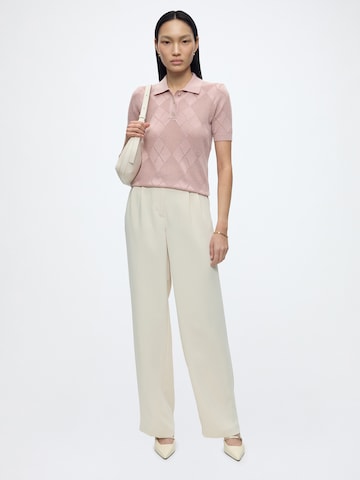 GUESS Sweter w kolorze różowy