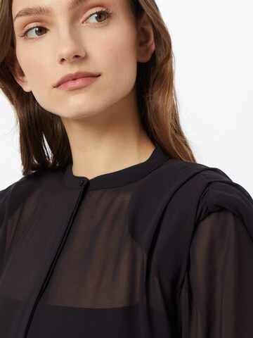 NU-IN - Blusa en negro