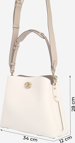 Borsa a spalla di COACH in beige