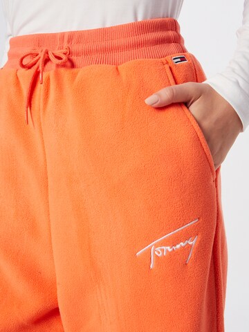 Tommy Jeans Zúžený strih Nohavice - oranžová
