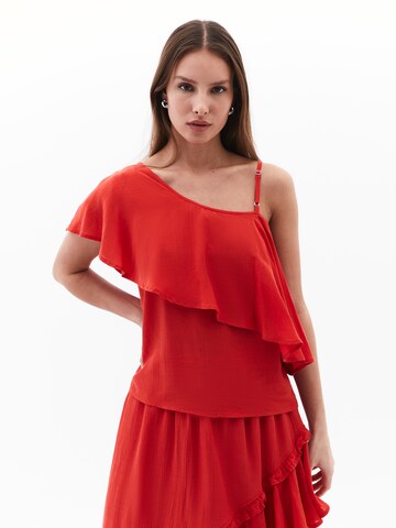 Top di OXXO in rosso