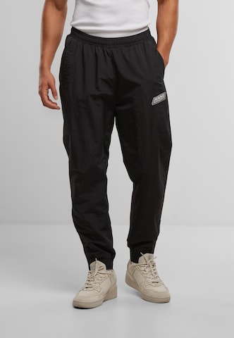 regular Pantaloni di Karl Kani in nero