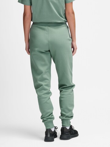 Effilé Pantalon de sport Hummel en vert