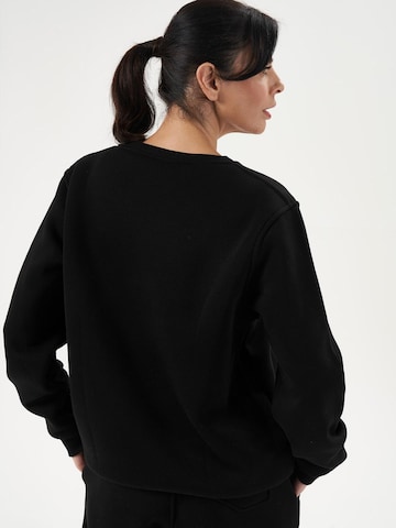 LOUIS LECLER Sweatshirt 'Avery' in Zwart