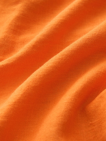 Combinaison Next en orange