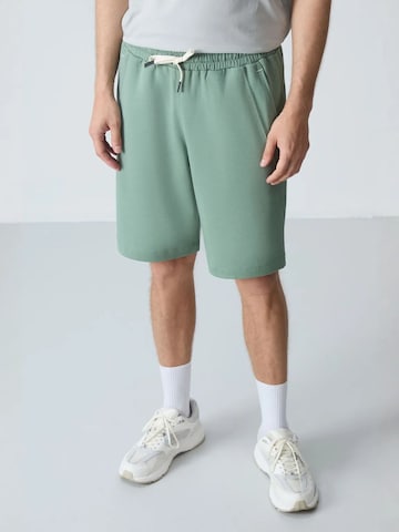 Tommy Life Regular Shorts in Grün: Vorderseite