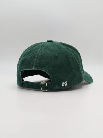 grippyglow Cap 'what's for snack today' in Grün