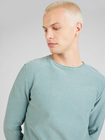 QS - Pullover em verde